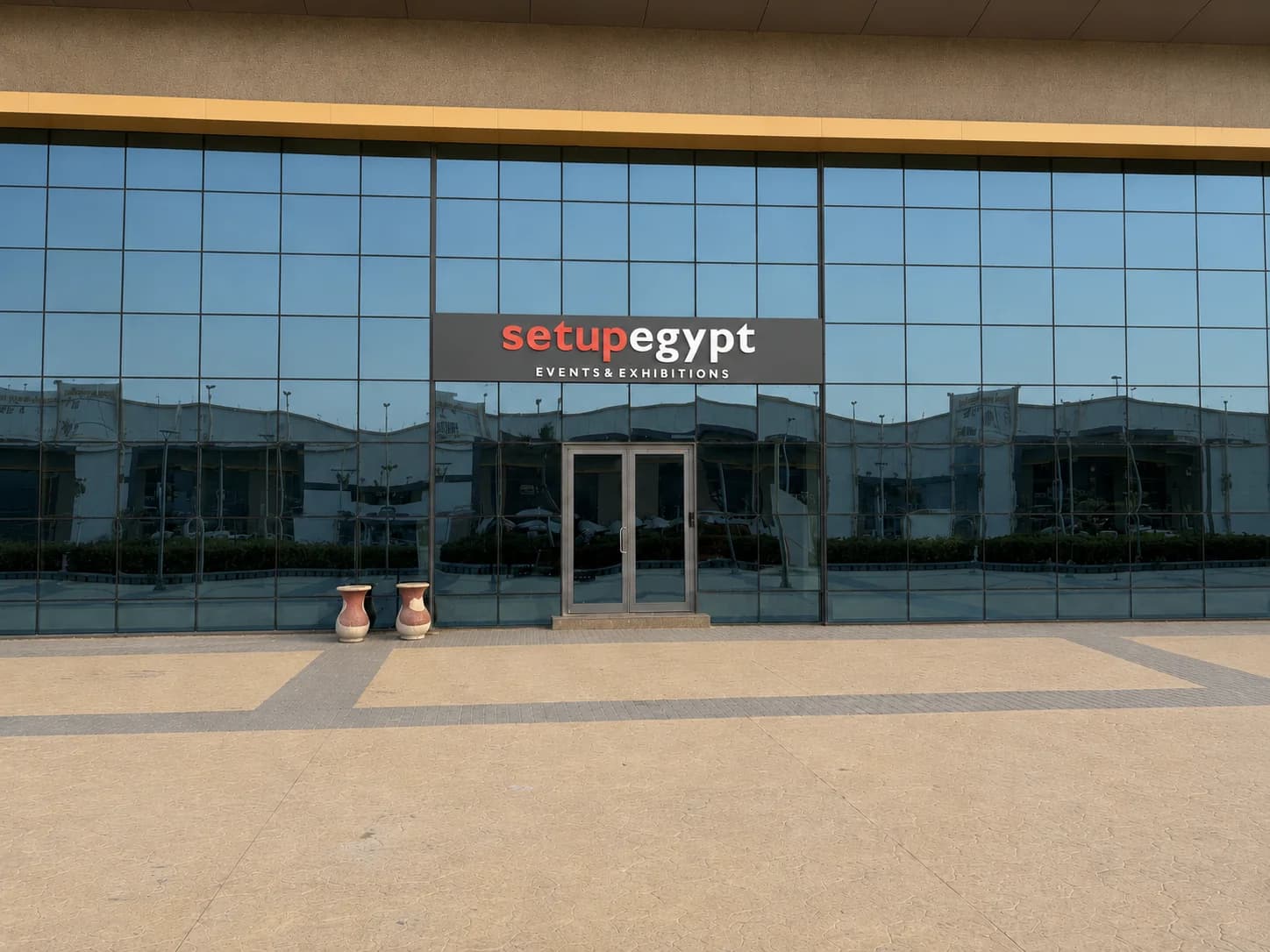 Setup Egypt Events & Exhibitions headquarters entrance with branded signage